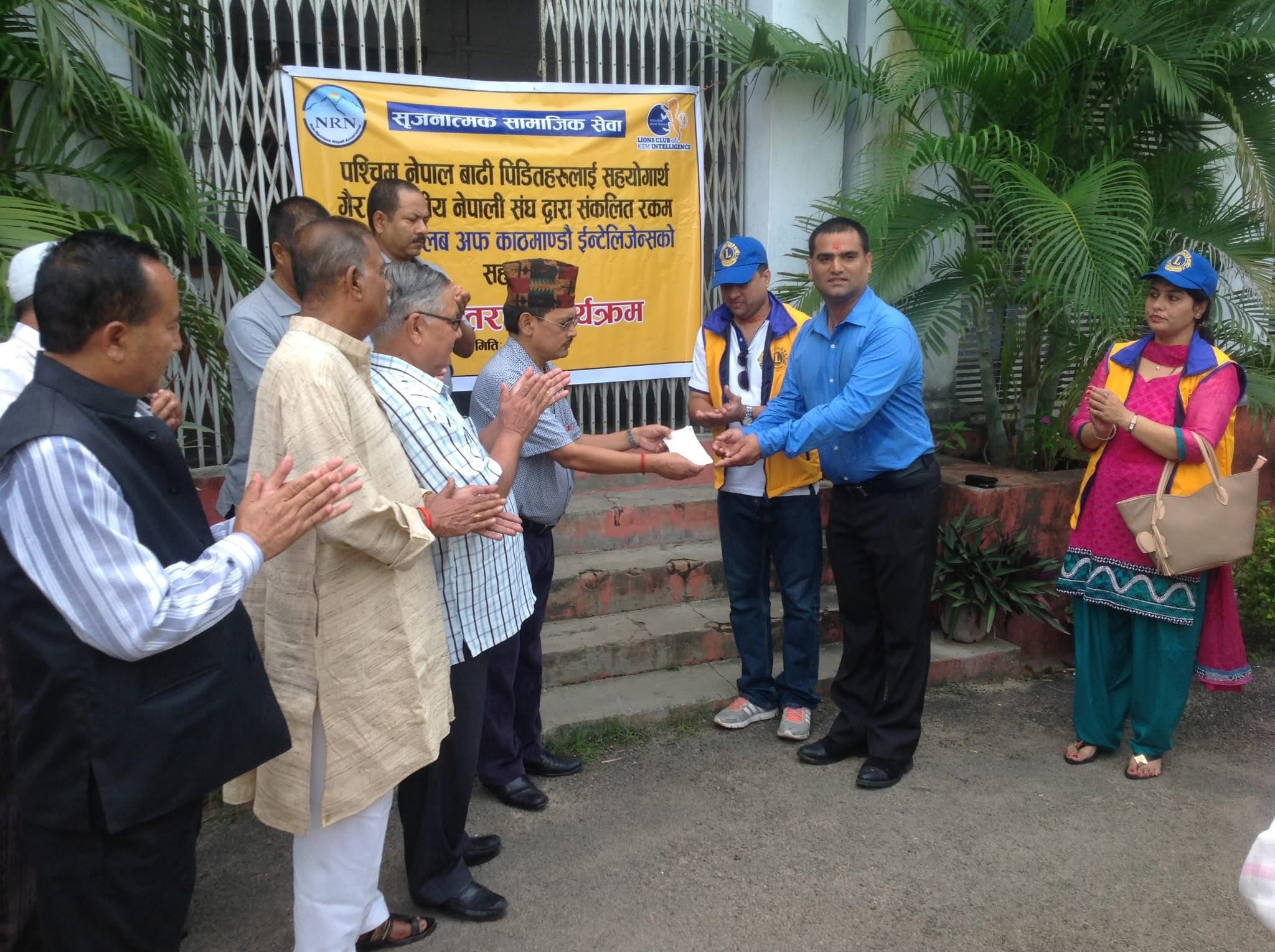 NRNA Donates NPR 2.38 Million to Mid-Western Nepal Flood Victims